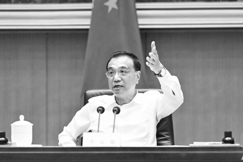 Chinese Premier Li Keqiang speaks at a teleconference on implementing policies to stabilize the economy on 25 May, 2022.